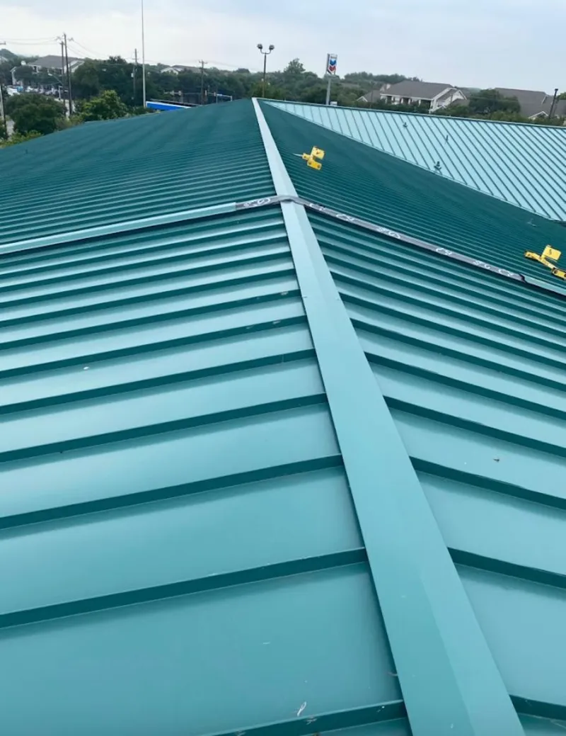 Green commercial metal roof ridge and valley for Metal Roof Repair in Rehoboth