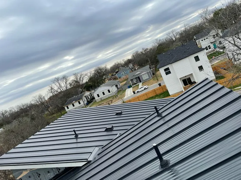 Standing seam metal roof panels with vents for Skylight Repair in Rehoboth